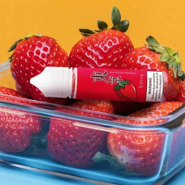 Iced strawberry yakult by tokyo in strawberry fruit display in orange background