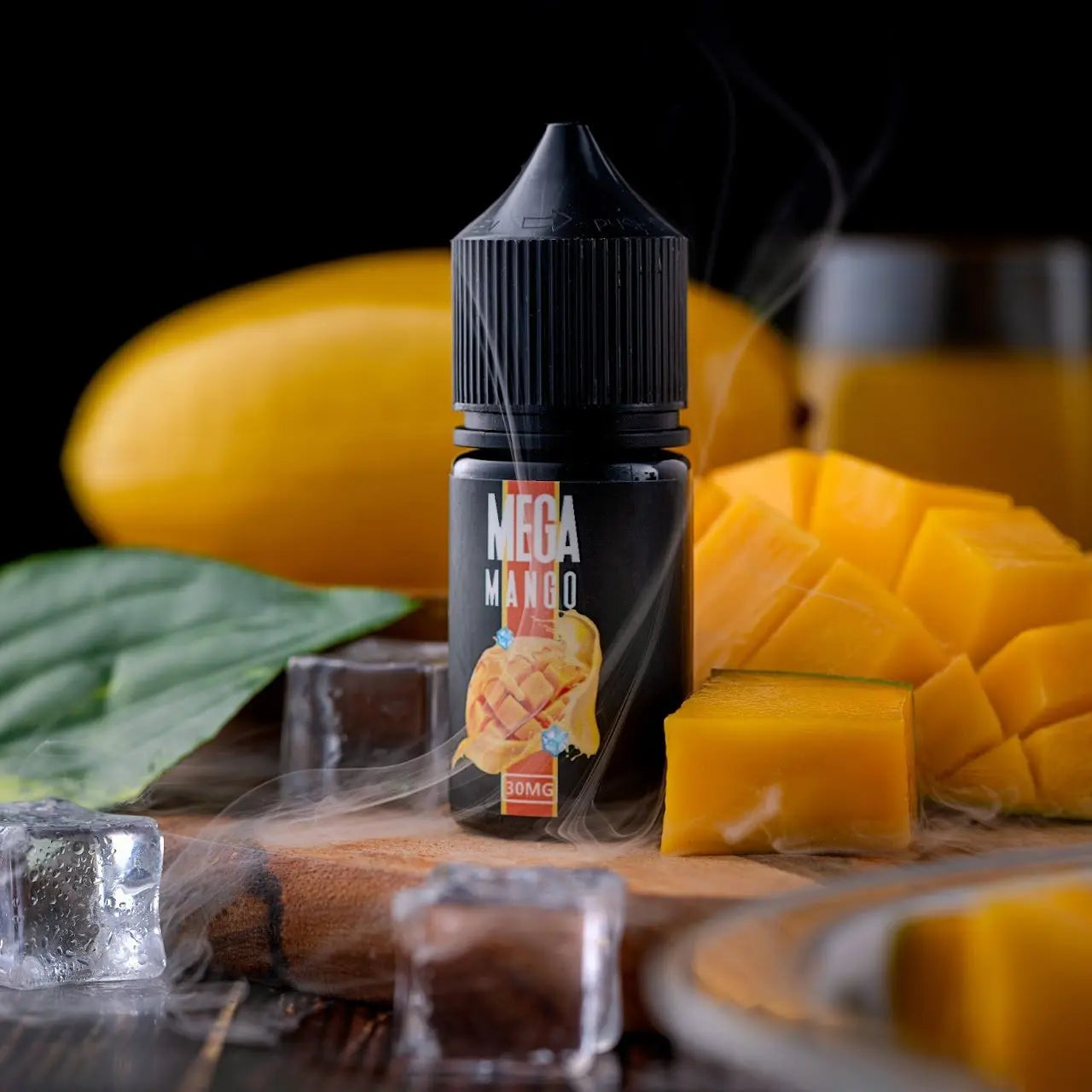 MEGA MANGO SALTNIC BY GRAND E-LIQUID IN 30ML BOTTLE WITH SLICE MANGO BACKGROUND