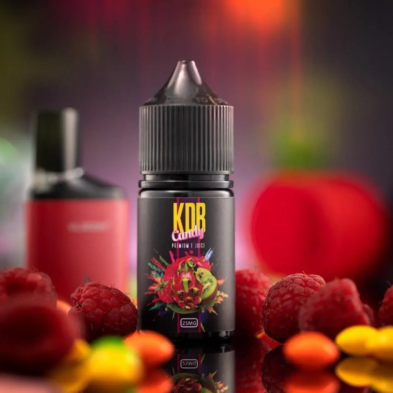 grand e-liquid kdb candy saltnic in 30ml bottle with fruits included with blurred background