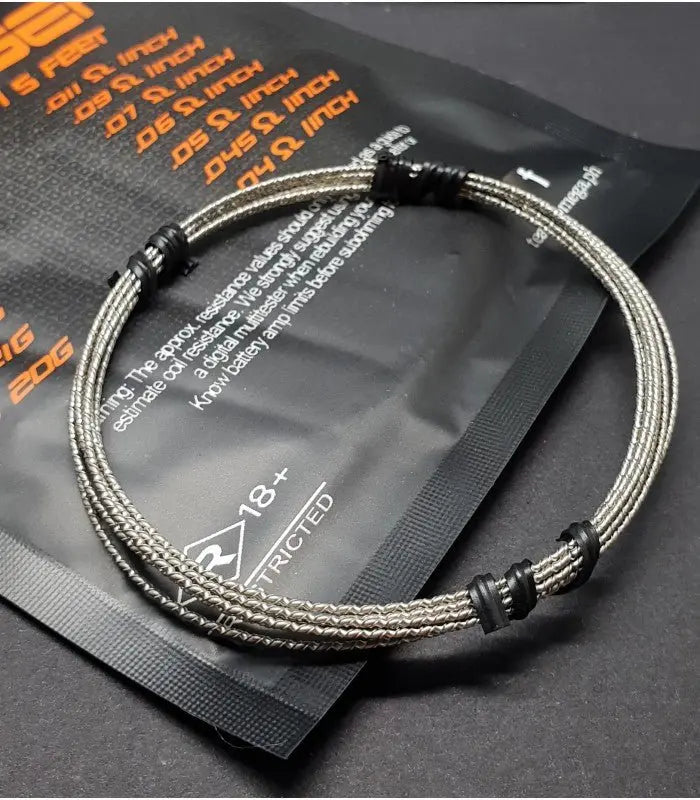 WIRE Bracelet with black and silver design on a dark background
