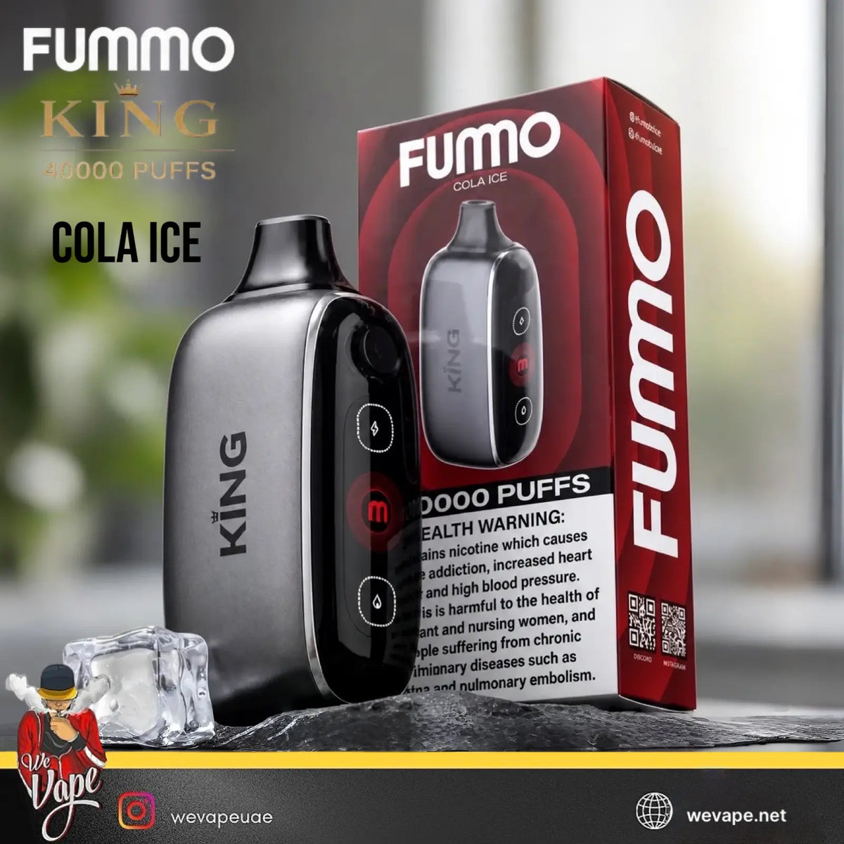A Fummo King Cola Ice disposable vape device in black and gray is shown next to its red and black retail box, with ice cubes in the foreground. The background is a blurred outdoor scene, and the Fummo branding is prominent.