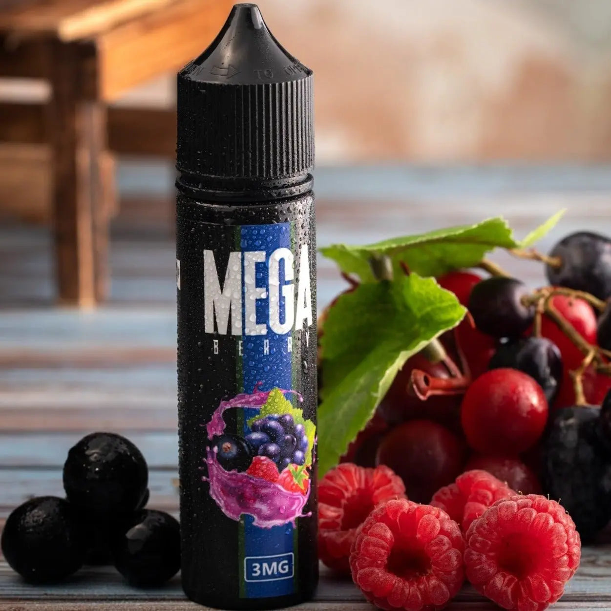 Black vape juice bottle labeled 'MEGA' with berries on a wooden surface