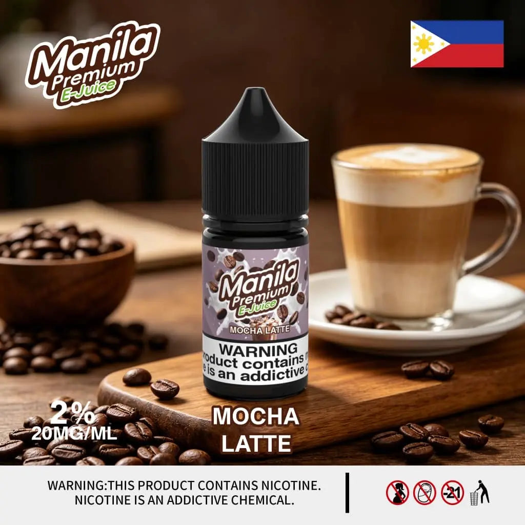 Manila Premium E-Juice Mocha Latte bottle with coffee beans and a cup of cappuccino on a wooden surface. Order Now and get 20% Discount!