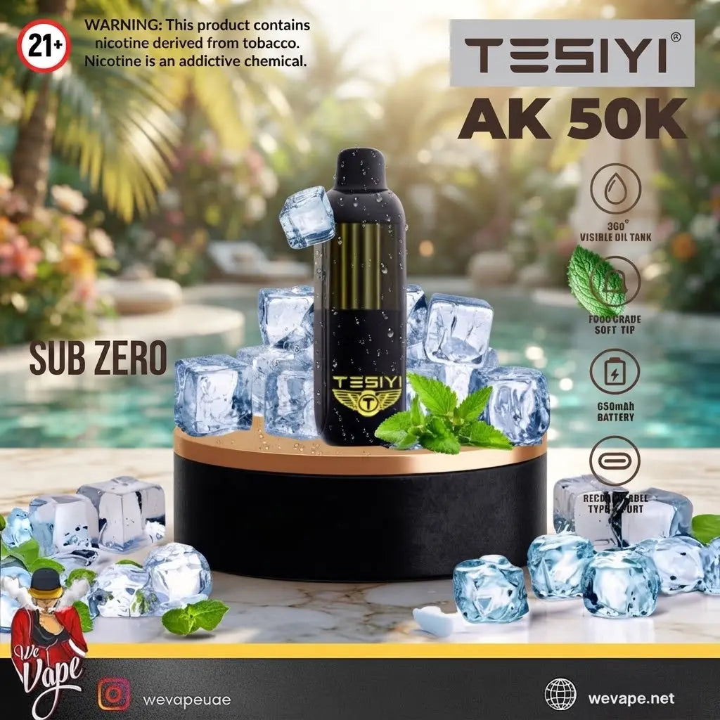 A black TESIYI AK 50K vape device with gold accents, displayed on a black and wood pedestal surrounded by ice cubes and mint leaves. The background depicts a tropical poolside setting.