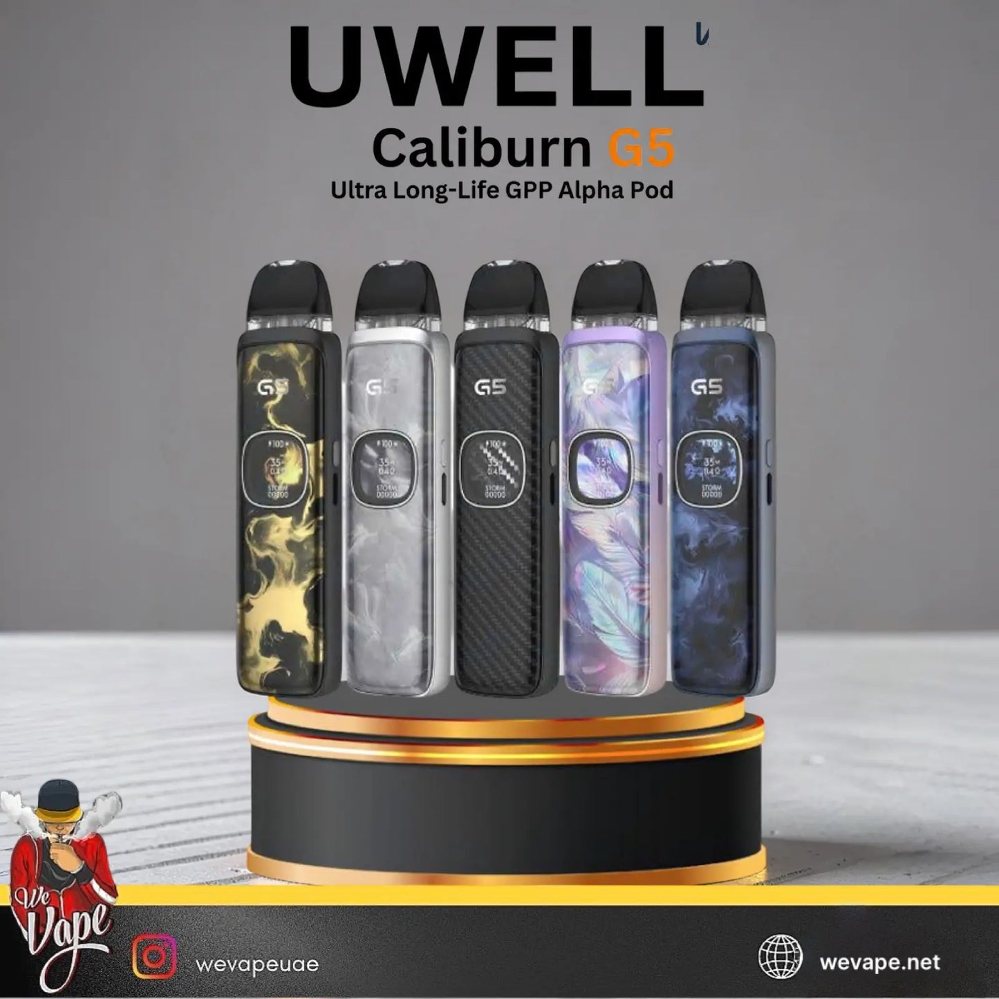 Five UWELL Caliburn G5 vape devices displayed upright on a black and gold pedestal. The devices feature different finishes: gold and black marbled, translucent gray and black marbled, black carbon fiber, iridescent purple and blue marbled, and dark gray marbled.