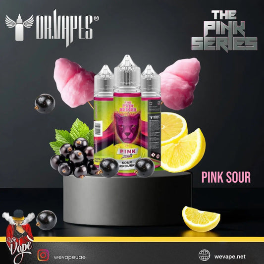 Orbulos Pink Sour vape juice bottles with pink cotton candy, black currants, and lemon slices on a dark background. Order Now and get FREE Delivery.