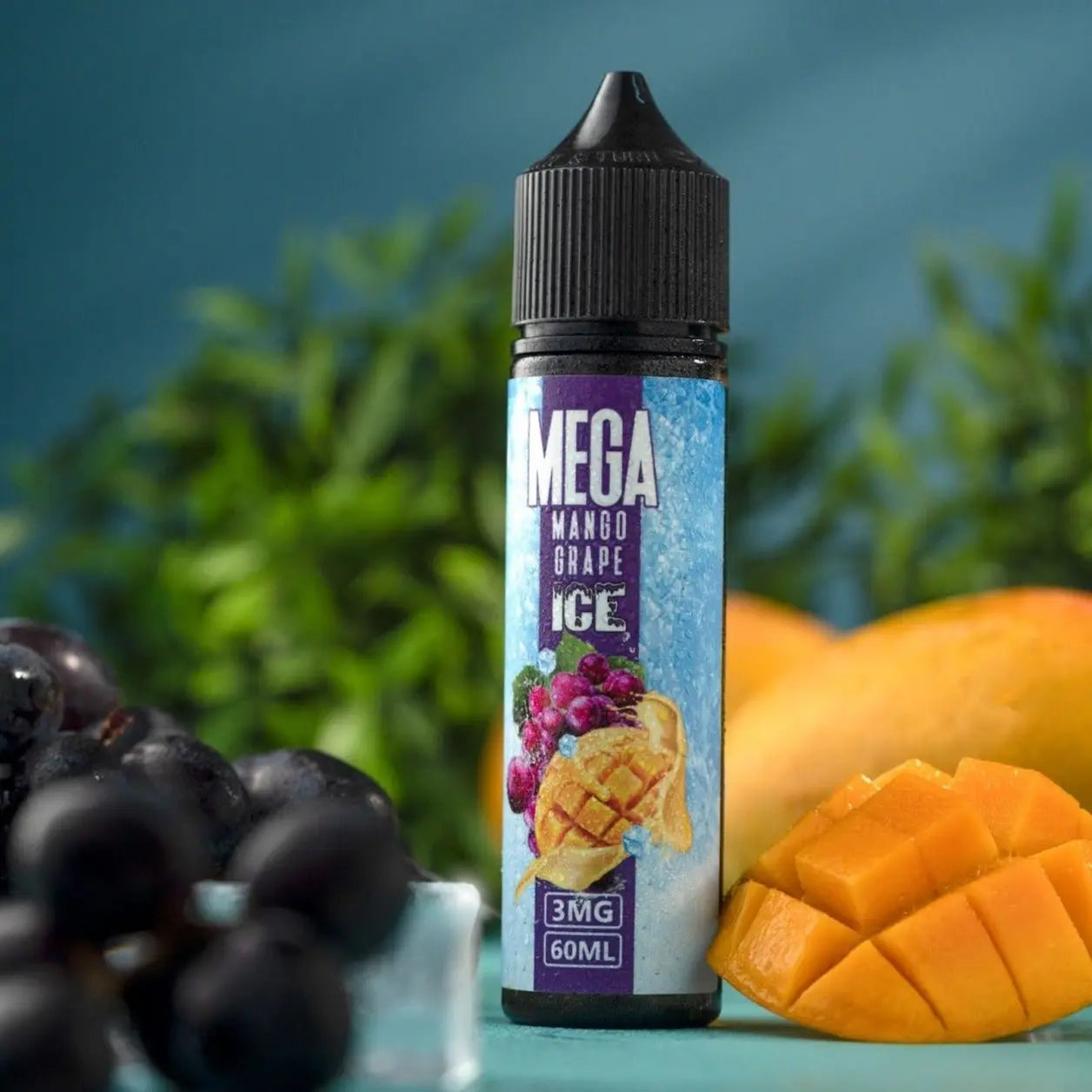 Mega Mango Grape Ice vape juice bottle with mango and grapes in the background