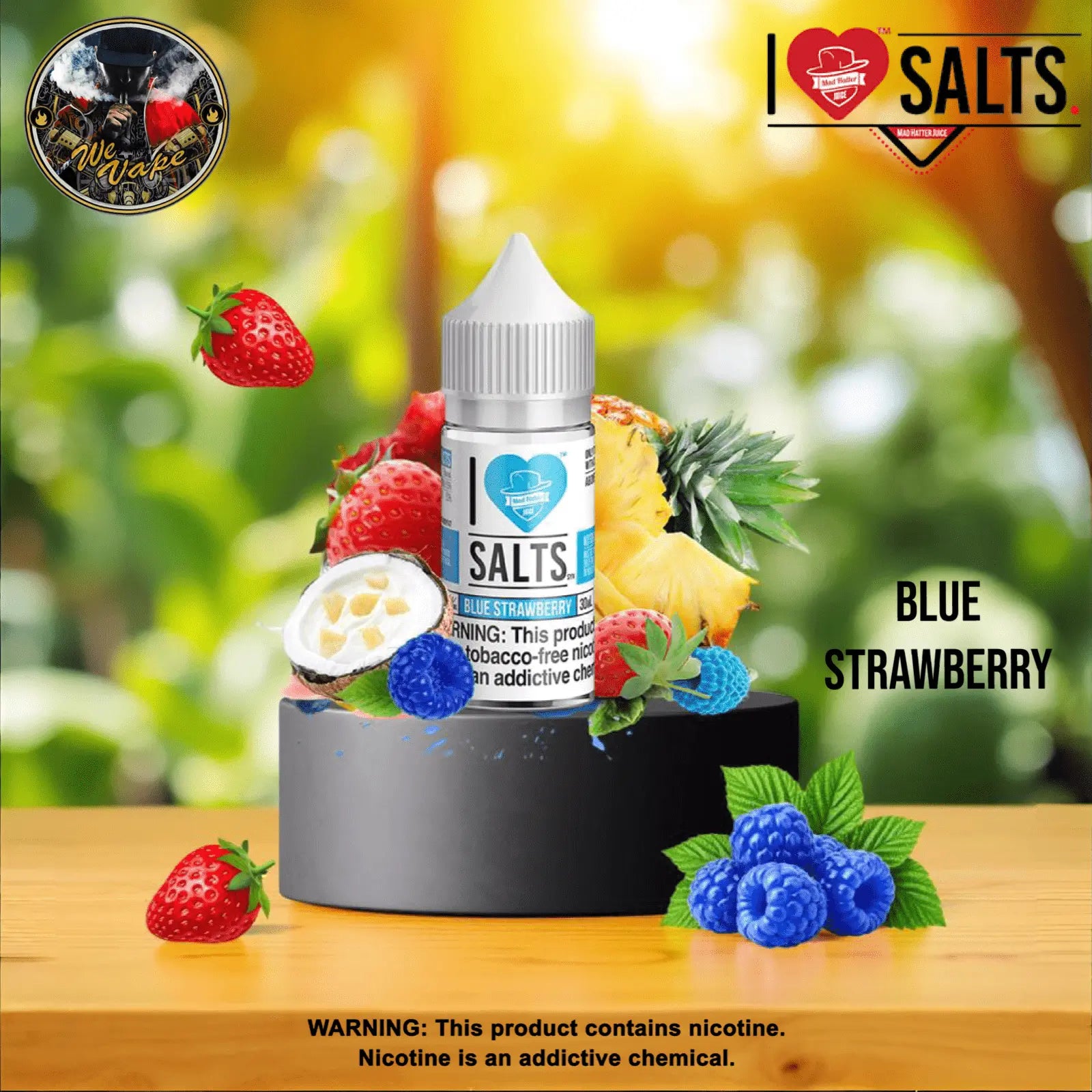 Bottle of I Love Salts Blue Strawberry flavor on a wooden surface with fruit decorations.