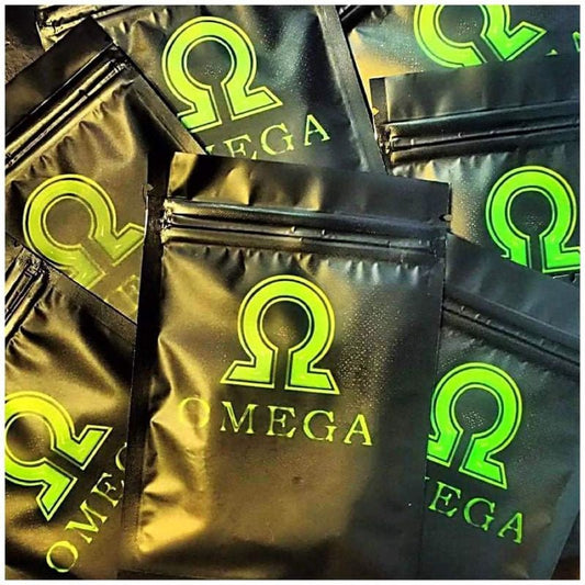 Black bags with green Omega logo on a pile